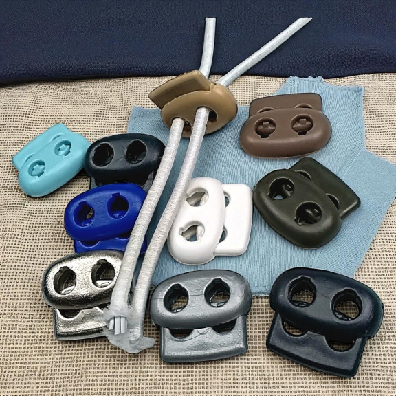 İki Delikli Plastik Stoper 5 mm Delik Çaplı Üstten Basmalı H005002